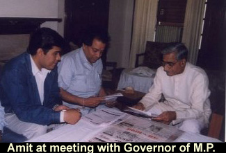 Amit Prakash far left meeting with Governor far right